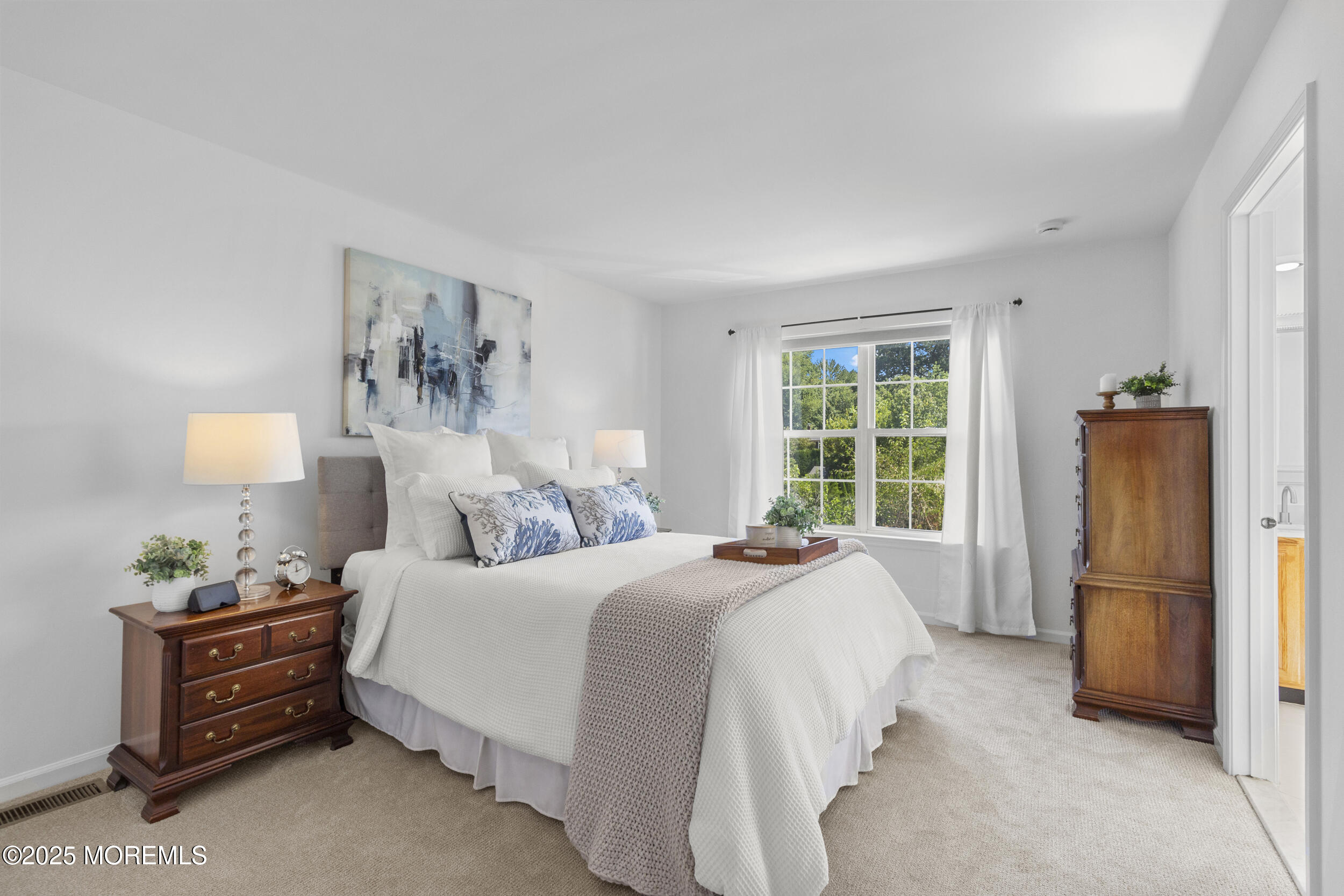 27 Danella Way Howell, NJ 07731 - Photo 12 of 25 a bedroom with a bed and a window