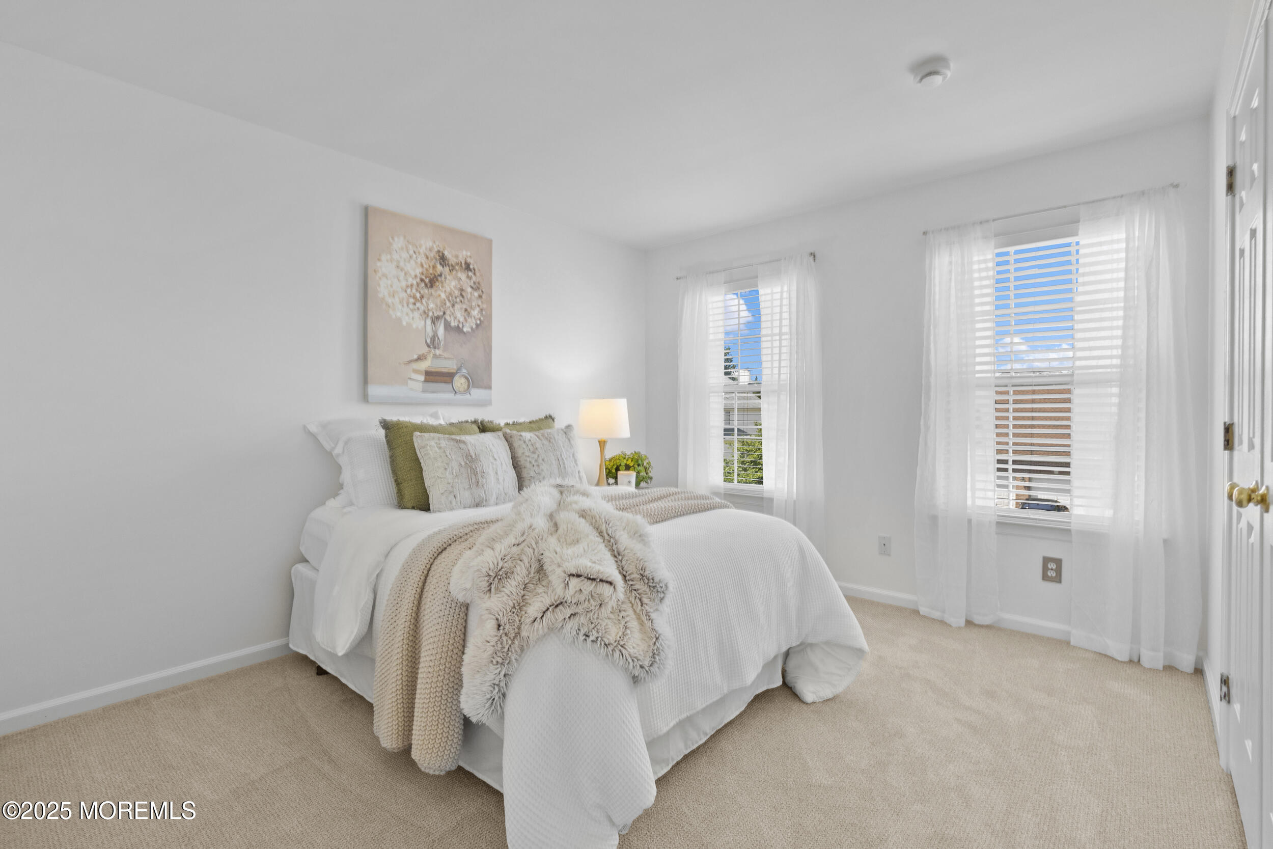 27 Danella Way Howell, NJ 07731 - Photo 16 of 25 a bed room with a bed and a window