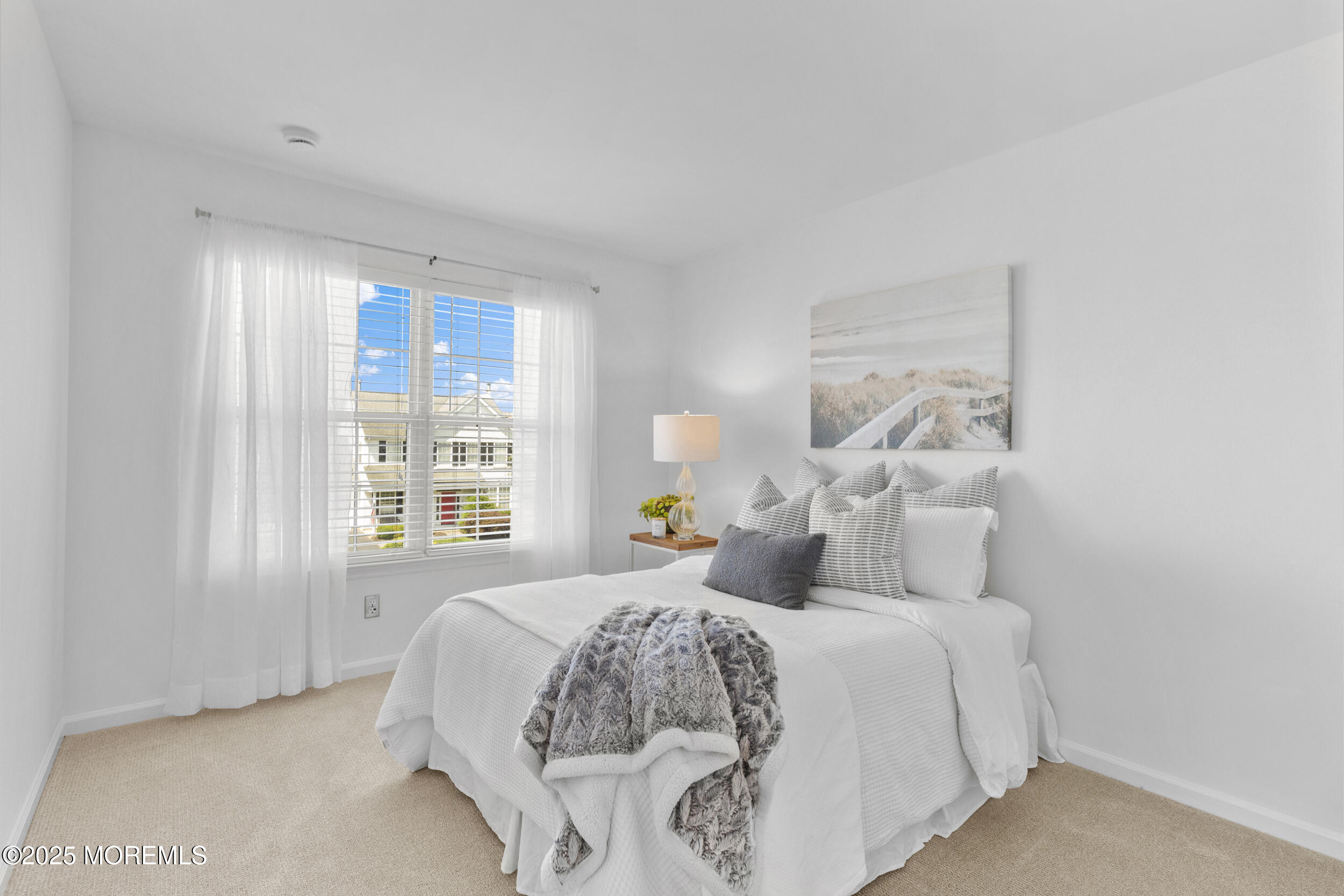 27 Danella Way Howell, NJ 07731 - Photo 17 of 25 a bedroom with a bed and a window