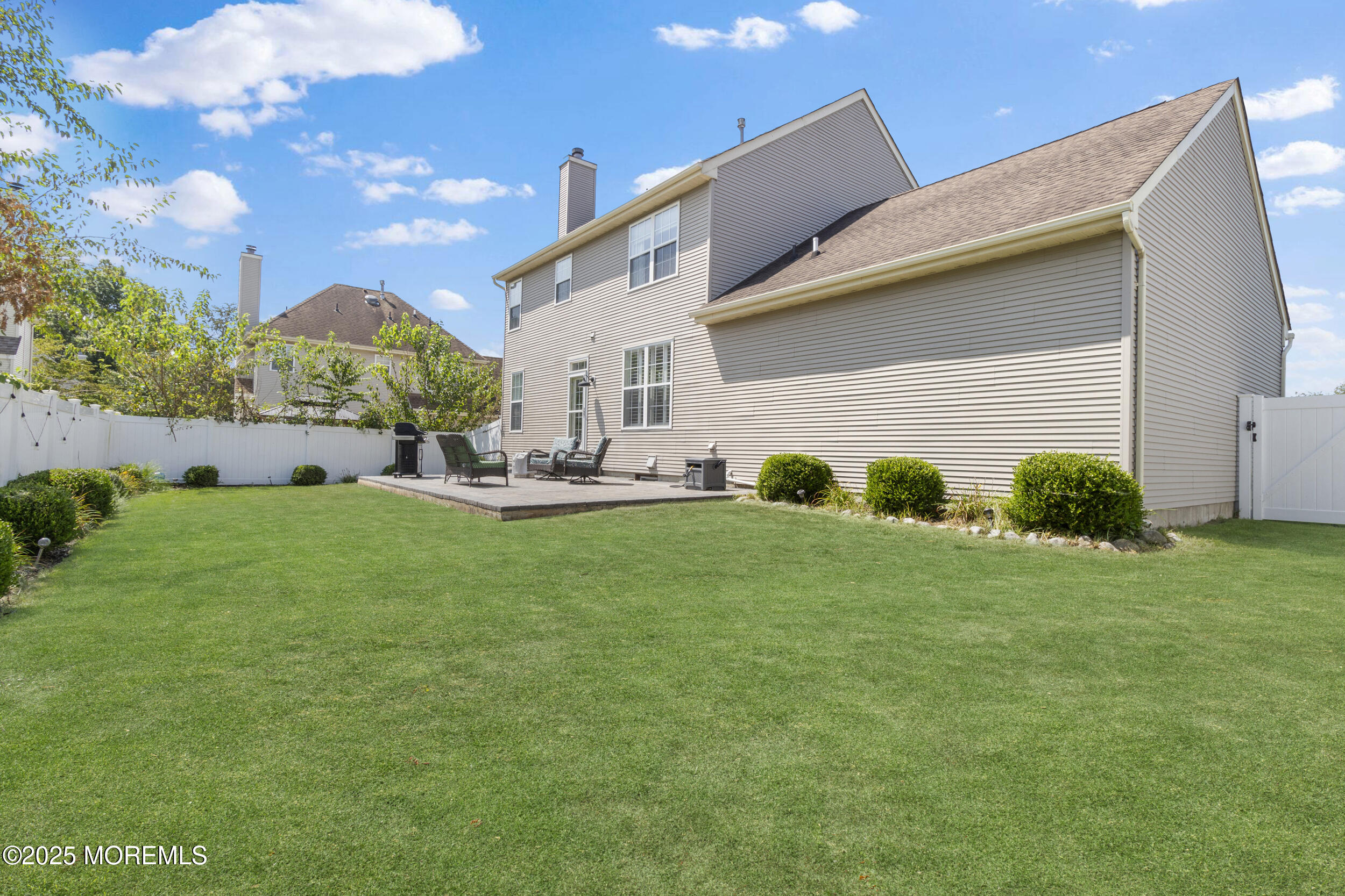 27 Danella Way Howell, NJ 07731 - Photo 24 of 25 a view of an house with backyard space and garden