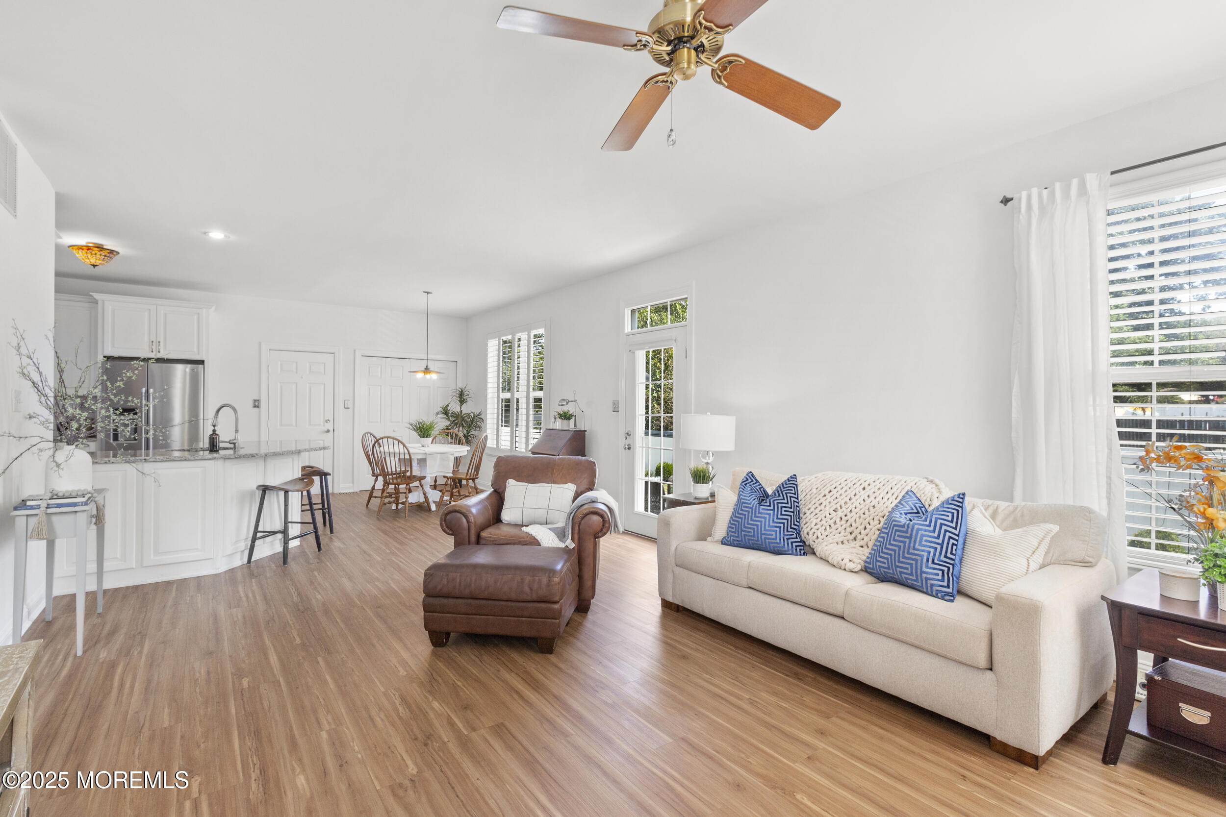27 Danella Way Howell, NJ 07731 - Photo 4 of 25 a living room with furniture and a wooden floor