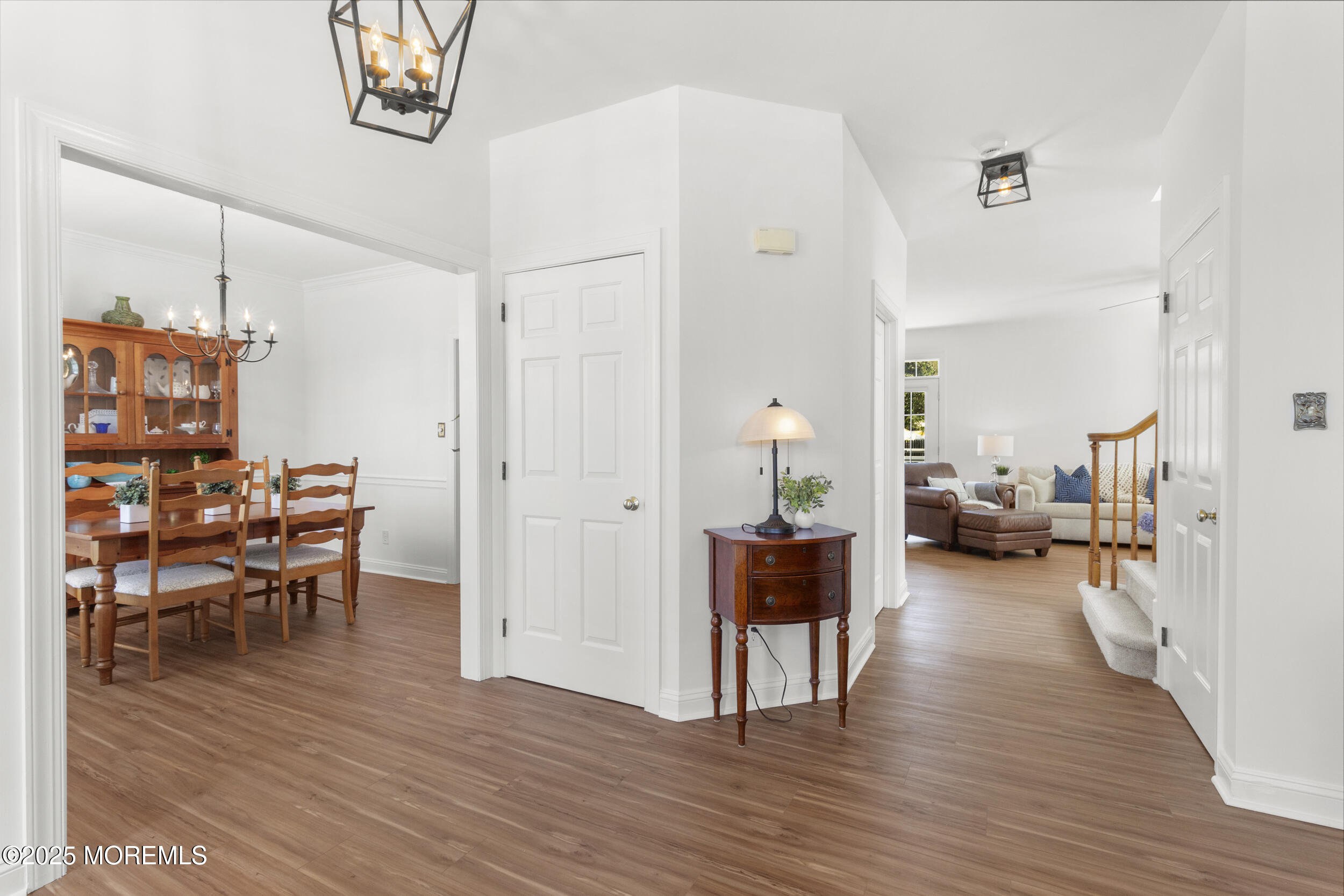 27 Danella Way Howell, NJ 07731 - Photo 7 of 25 a view of a livingroom with furniture and a hardwood floor