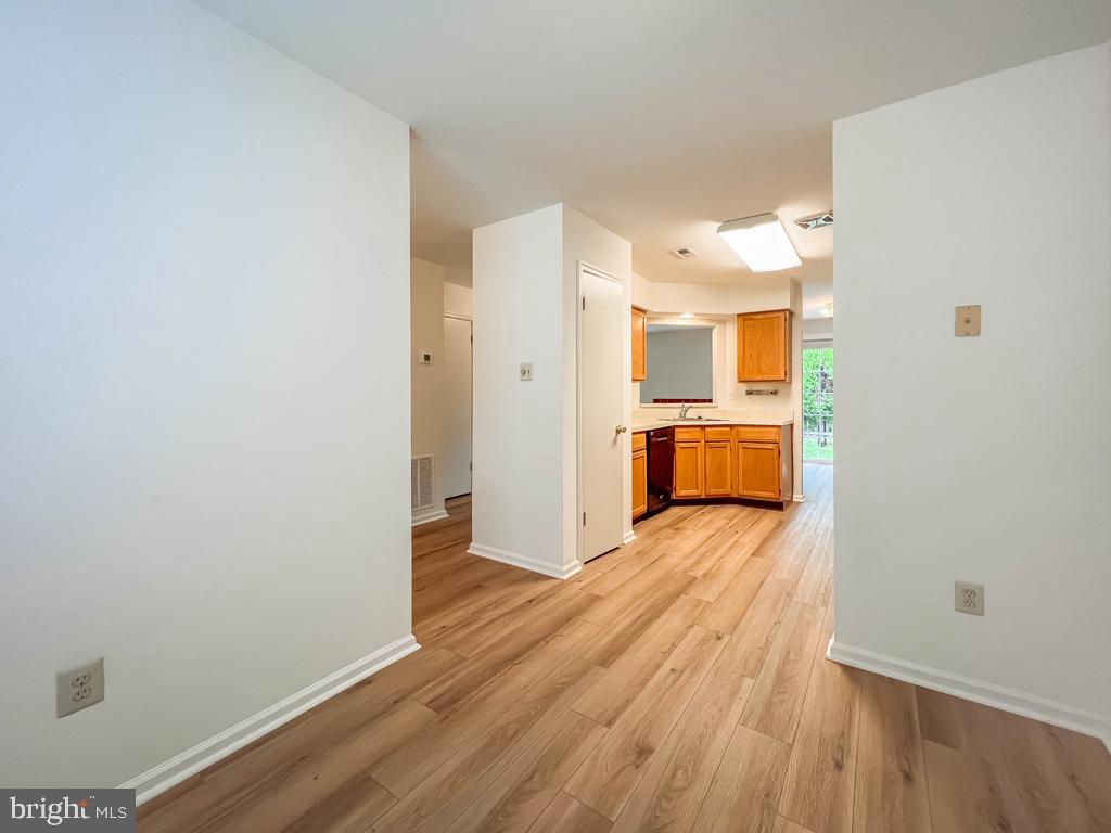 14 Carousel Circle Doylestown, PA 18901 - Photo 14 of 35 a view of a kitchen with wooden floor and a refrigerator