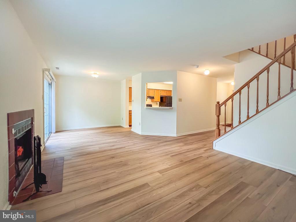 14 Carousel Circle Doylestown, PA 18901 - Photo 2 of 35 a view of empty room with wooden floor and fan