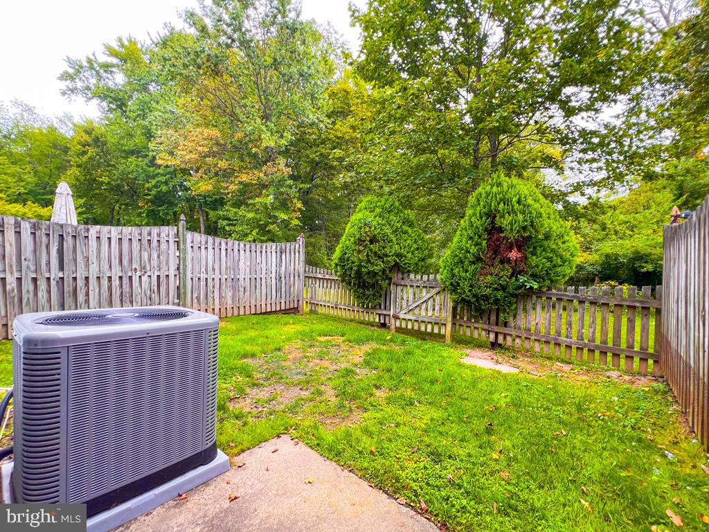 14 Carousel Circle Doylestown, PA 18901 - Photo 32 of 35 a view of a backyard with a small cabin and wooden fence