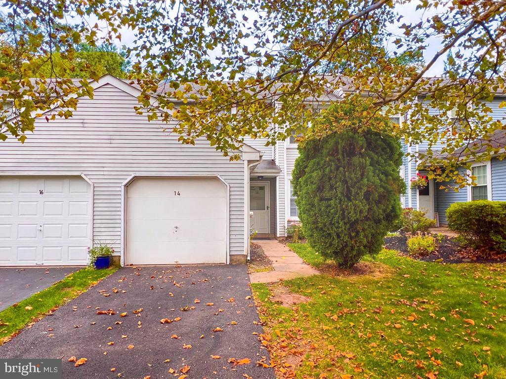 14 Carousel Circle Doylestown, PA 18901 - Photo 35 of 35 a front view of a house with a yard and garage