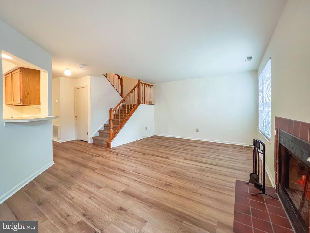 14 Carousel Circle Doylestown, PA 18901 - Photo 4 of 35 a view of an empty room with wooden floor and a window