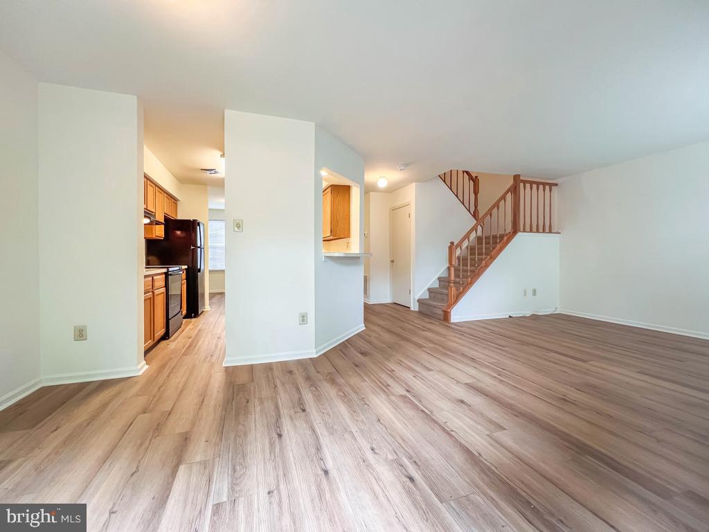 14 Carousel Circle Doylestown, PA 18901 - Photo 5 of 35 a view of a room with wooden floor and stairs