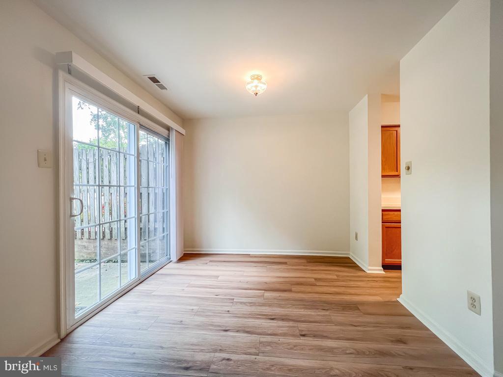 14 Carousel Circle Doylestown, PA 18901 - Photo 6 of 35 wooden floor in an empty room with a window