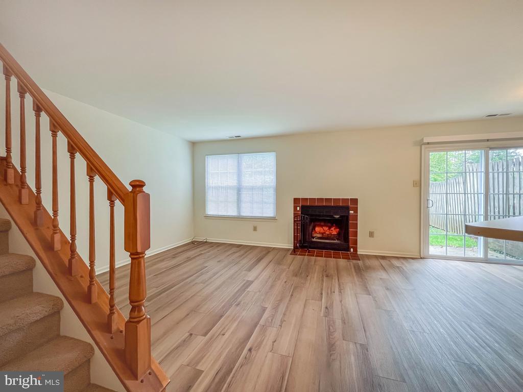 14 Carousel Circle Doylestown, PA 18901 - Photo 8 of 35 a view of an empty room with wooden floor and a window