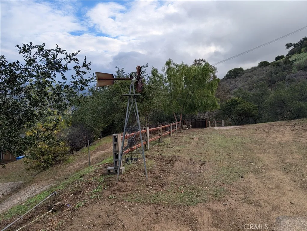 1087 Loma Simi Valley Simi Valley, CA 93063 - Photo 3 of 17 a view of a dry yard with trees