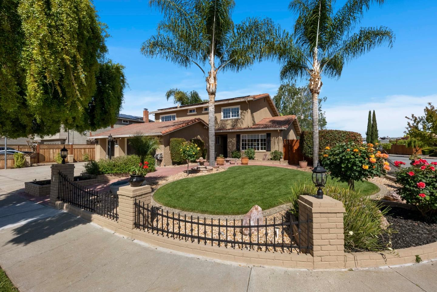 6570 Thames Drive Gilroy, CA 95020 - Photo 1 of 30 a front view of a house with garden and porch