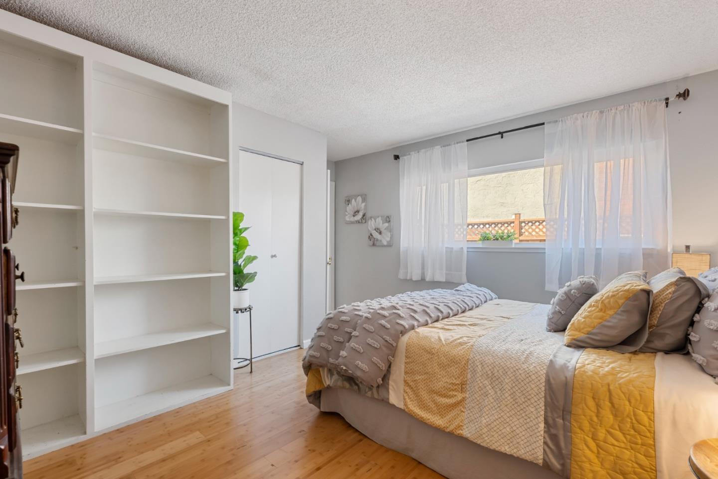 6570 Thames Drive Gilroy, CA 95020 - Photo 11 of 30 a bedroom with a bed and a window