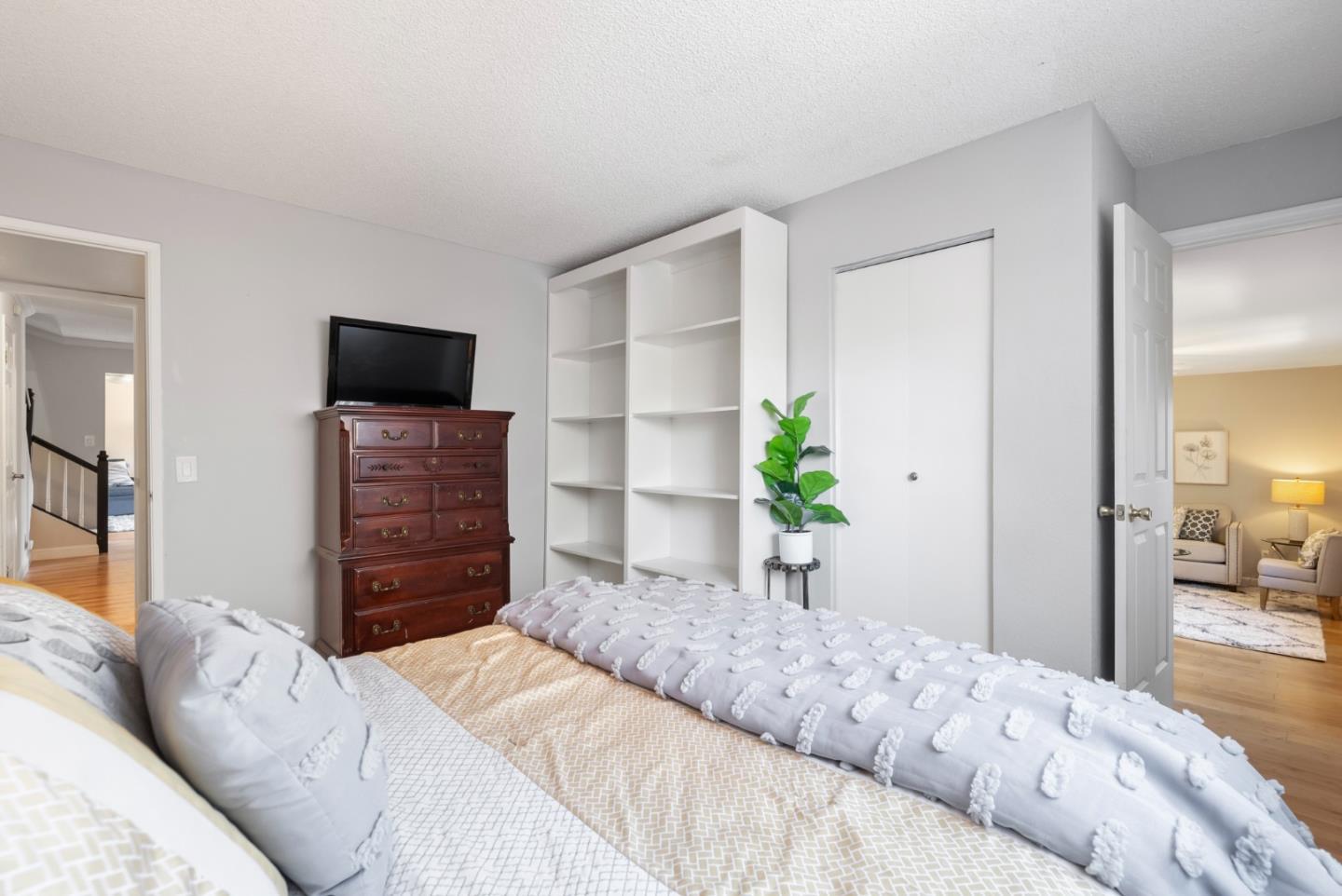 6570 Thames Drive Gilroy, CA 95020 - Photo 12 of 30 a bedroom with a bed and a flat screen television