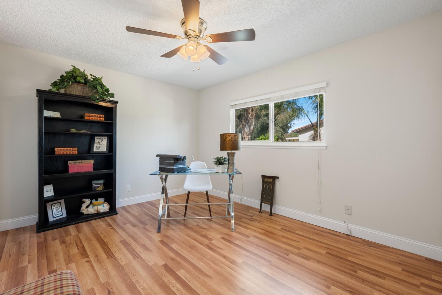 6570 Thames Drive Gilroy, CA 95020 - Photo 22 of 30 a view of a workspace with furniture and wooden floor