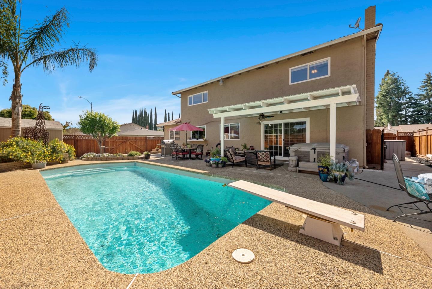 6570 Thames Drive Gilroy, CA 95020 - Photo 25 of 30 a view of a house with backyard porch and sitting area