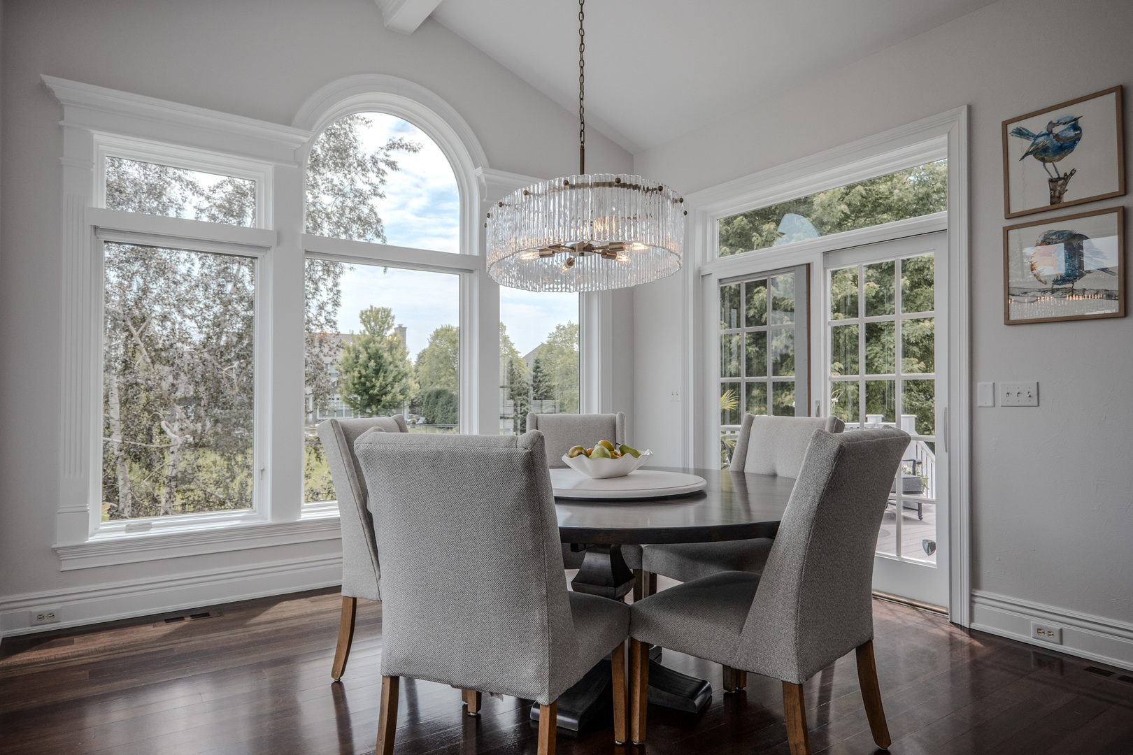 39-w915 Catlin Square Geneva, IL 60134 - Photo 14 of 58 a dining room with furniture a chandelier and wooden floor