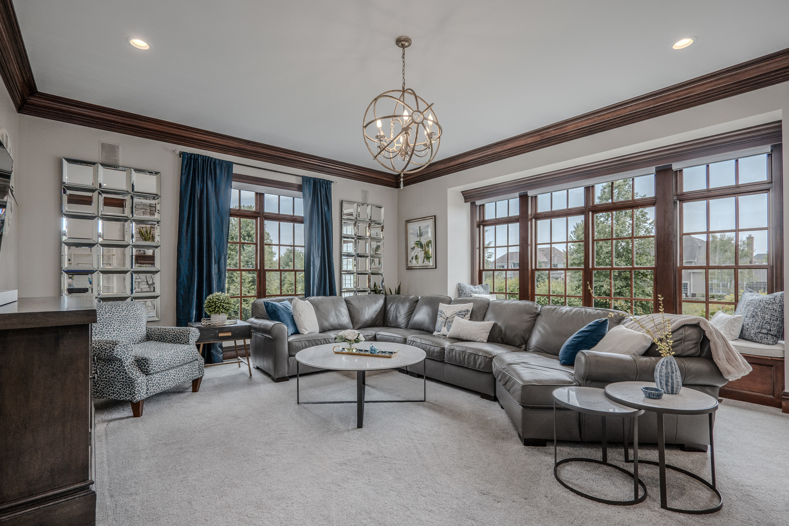 39-w915 Catlin Square Geneva, IL 60134 - Photo 16 of 58 a living room with furniture and floor to ceiling windows