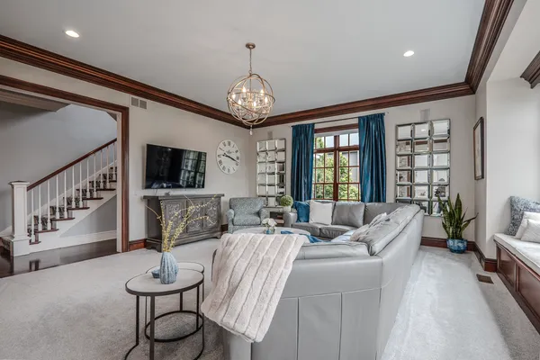 a bathroom with a sink vanity and a toilet
