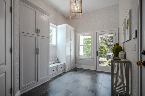 a bedroom with bed and a couch