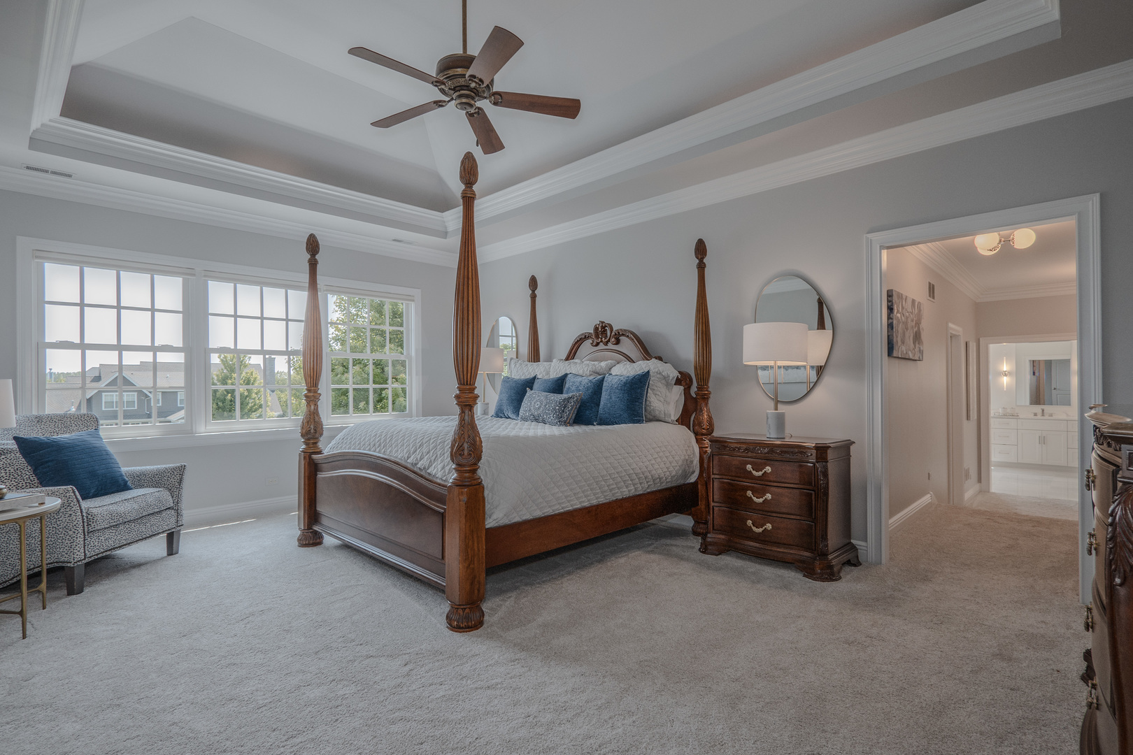 39-w915 Catlin Square Geneva, IL 60134 - Photo 26 of 58 a bedroom with a bed couch chandelier and window