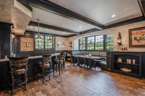 a view of a livingroom with furniture and a ceiling fan