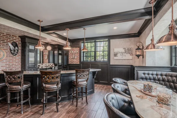 a workspace with furniture and wooden floor