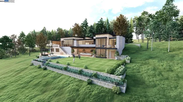 a view of a wooden house with a big yard and large trees