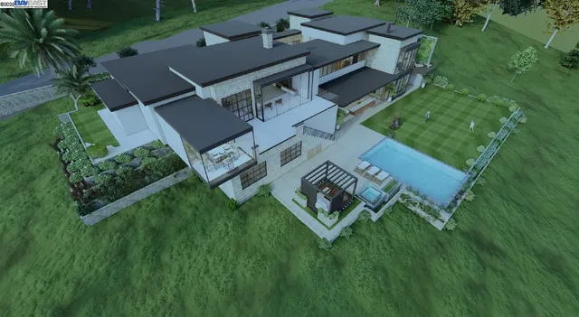 an aerial view of a house with a garden