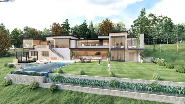 a view of a house with a yard and fence