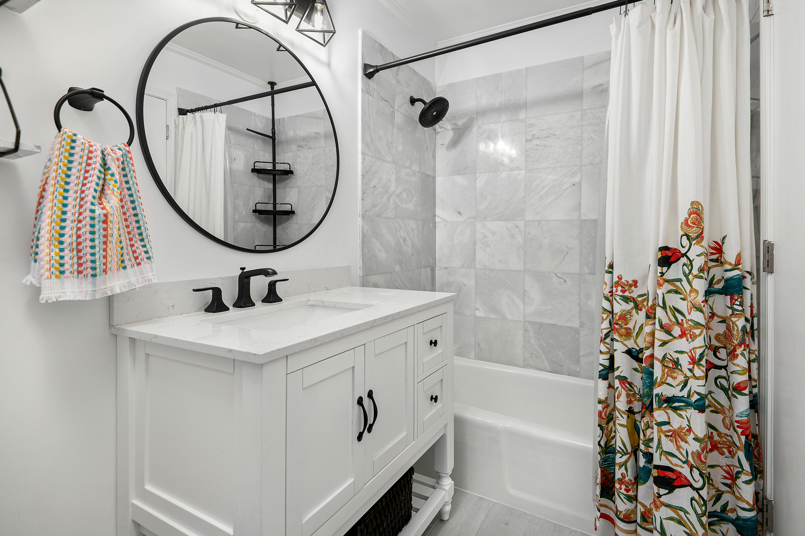 4061 North Sheridan Road, Unit 1 Chicago, IL 60613 - Photo 16 of 26 a bathroom with a sink and a mirror