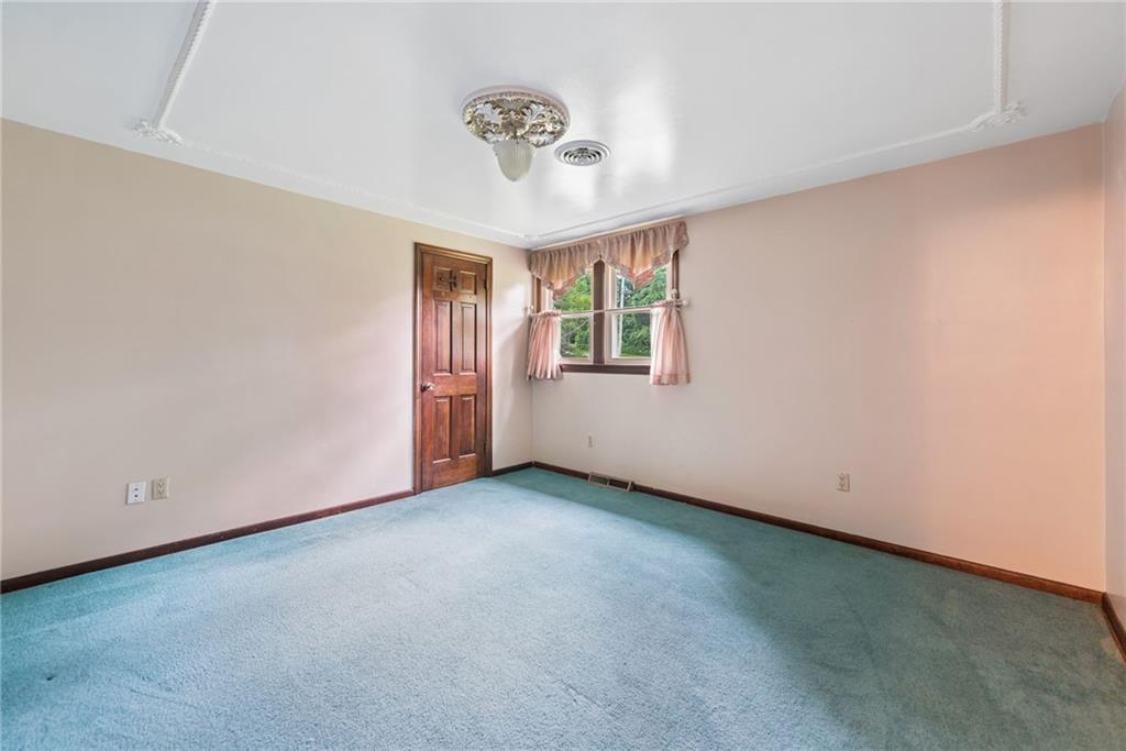 22 Buzzardtown Road Irwin, PA 15642 - Photo 26 of 44 an empty room with windows