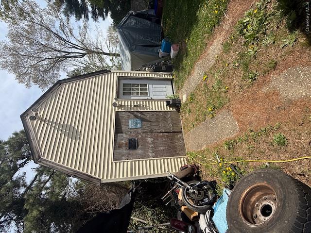 511 Wicks Road Brentwood, NY 11717 - Photo 2 of 4 a front view of a house with garden