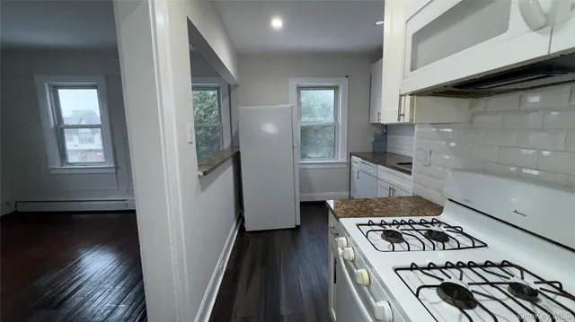 a bathroom with a sink toilet and bathtub