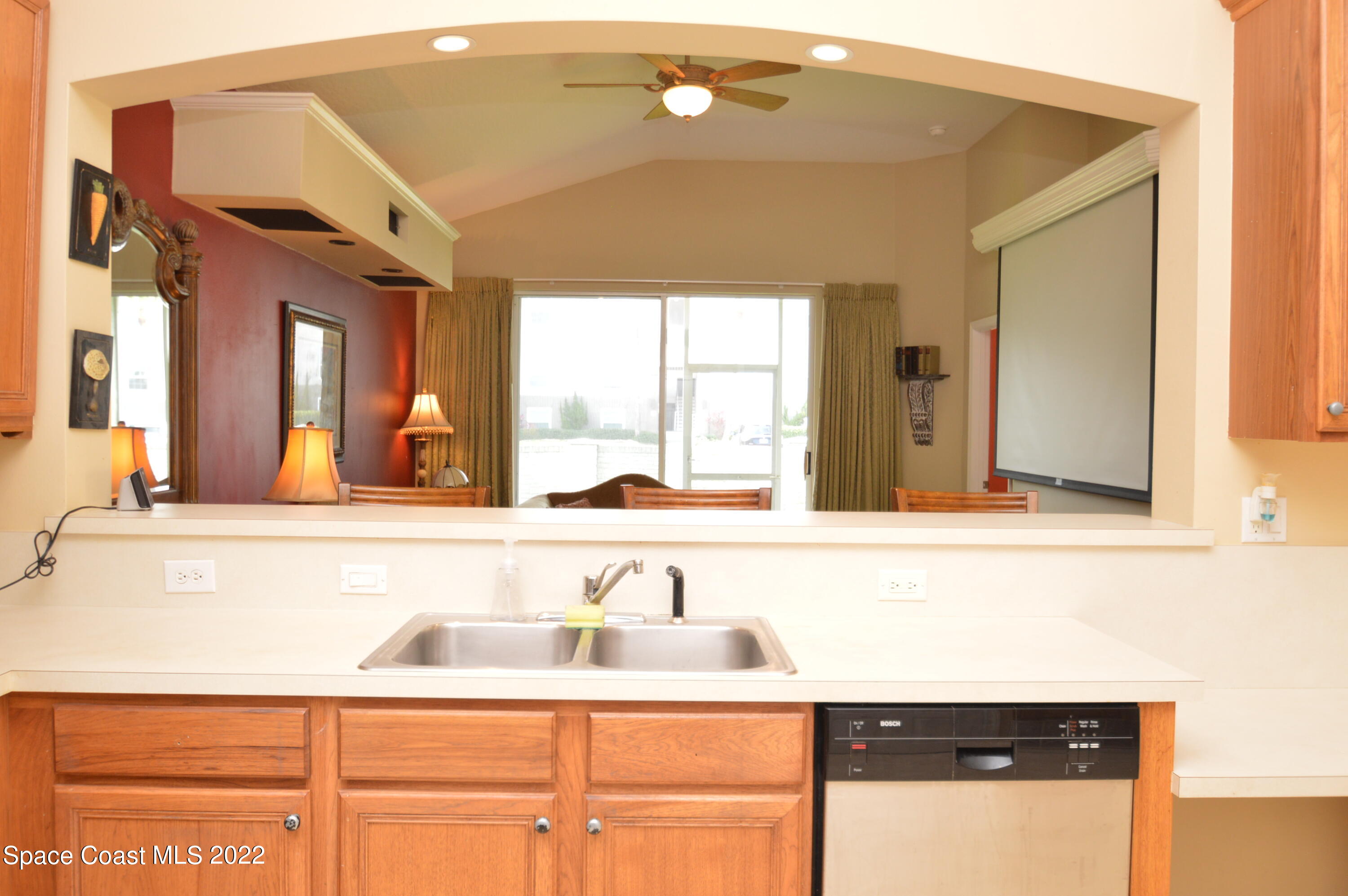274 Intrepid Way Indialantic, FL 32903 - Photo 20 of 23 a bathroom with a sink a vanity and a mirror