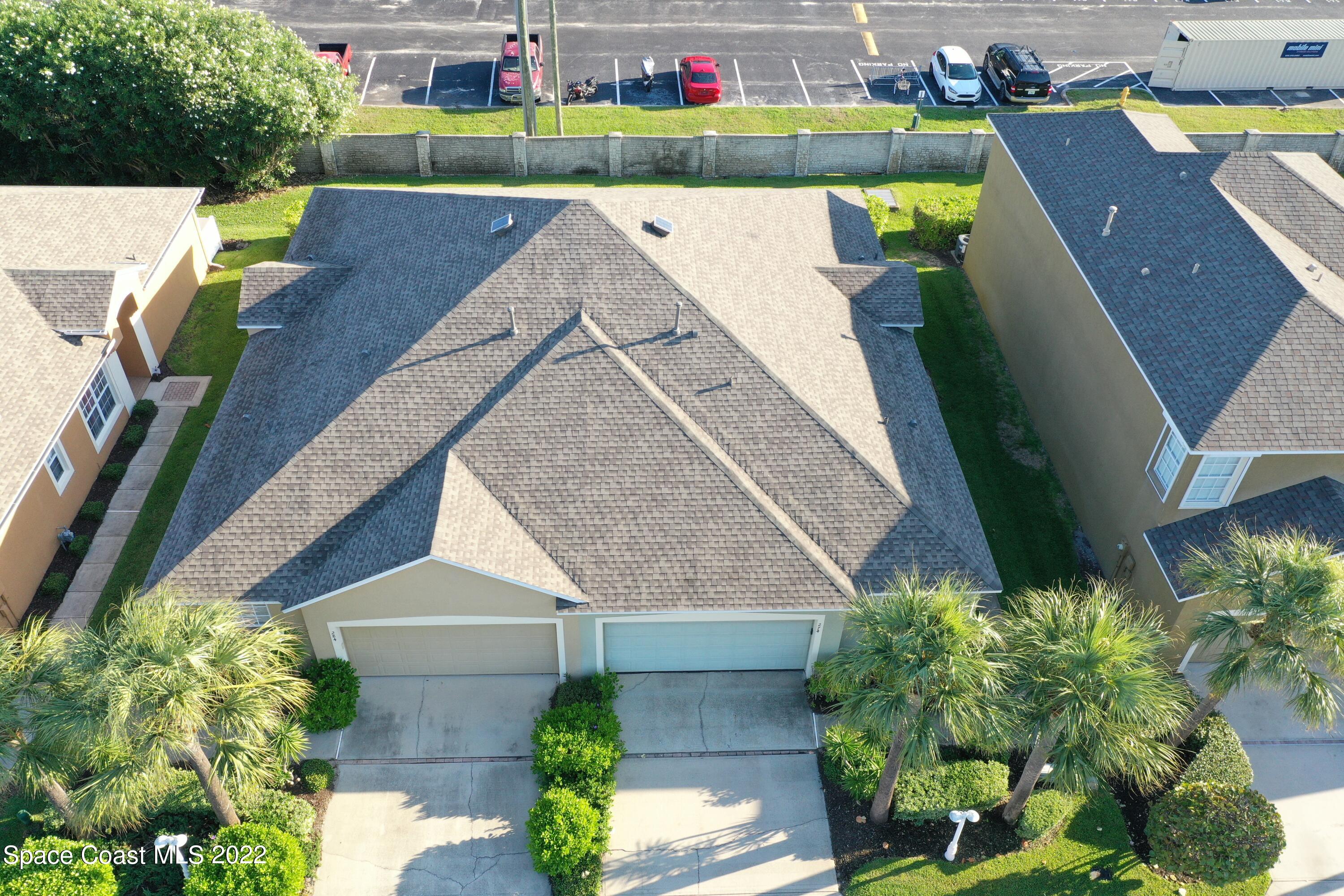 274 Intrepid Way Indialantic, FL 32903 - Photo 2 of 23 a view of a swimming pool with a patio