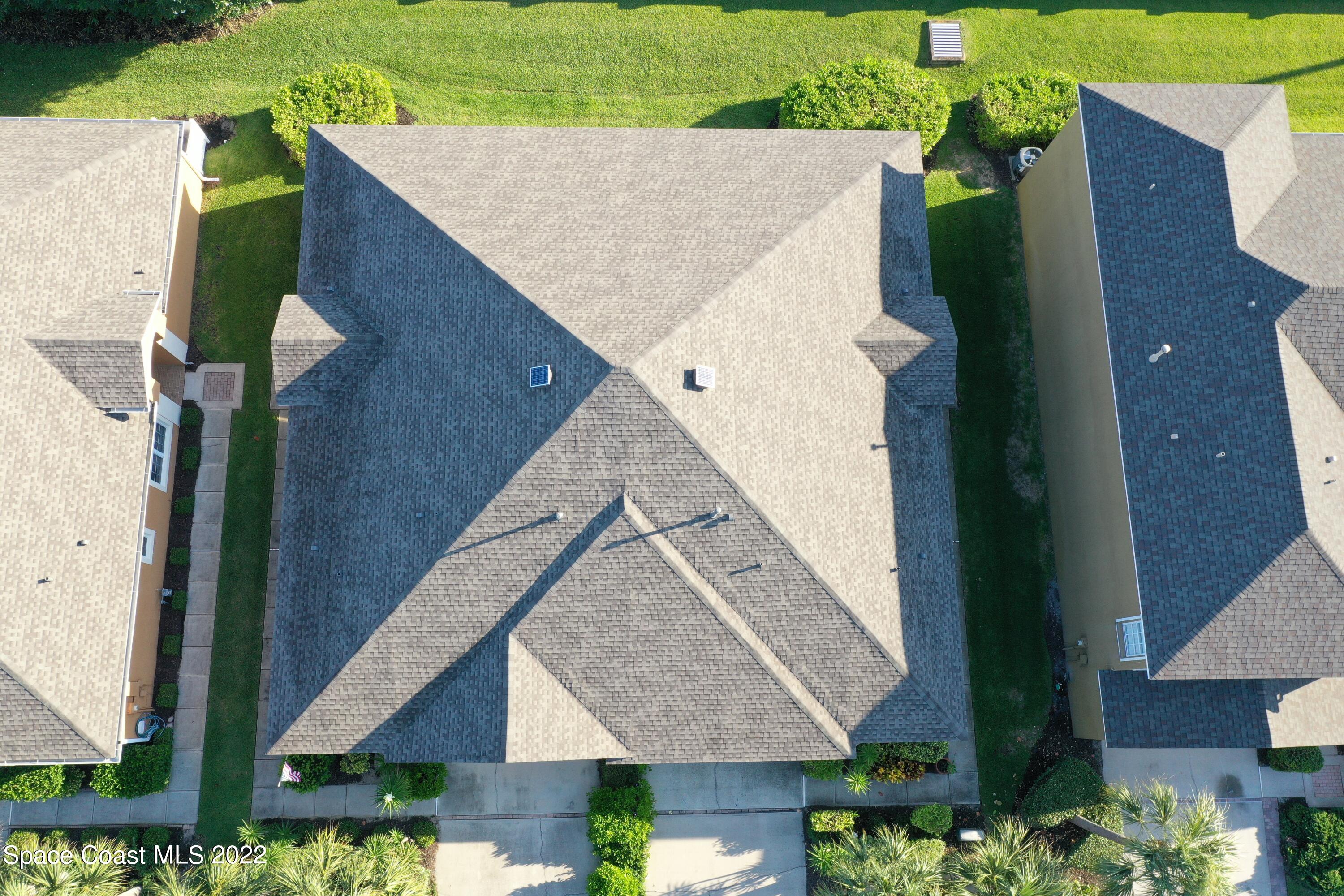 274 Intrepid Way Indialantic, FL 32903 - Photo 3 of 23 an aerial view of a house with a yard