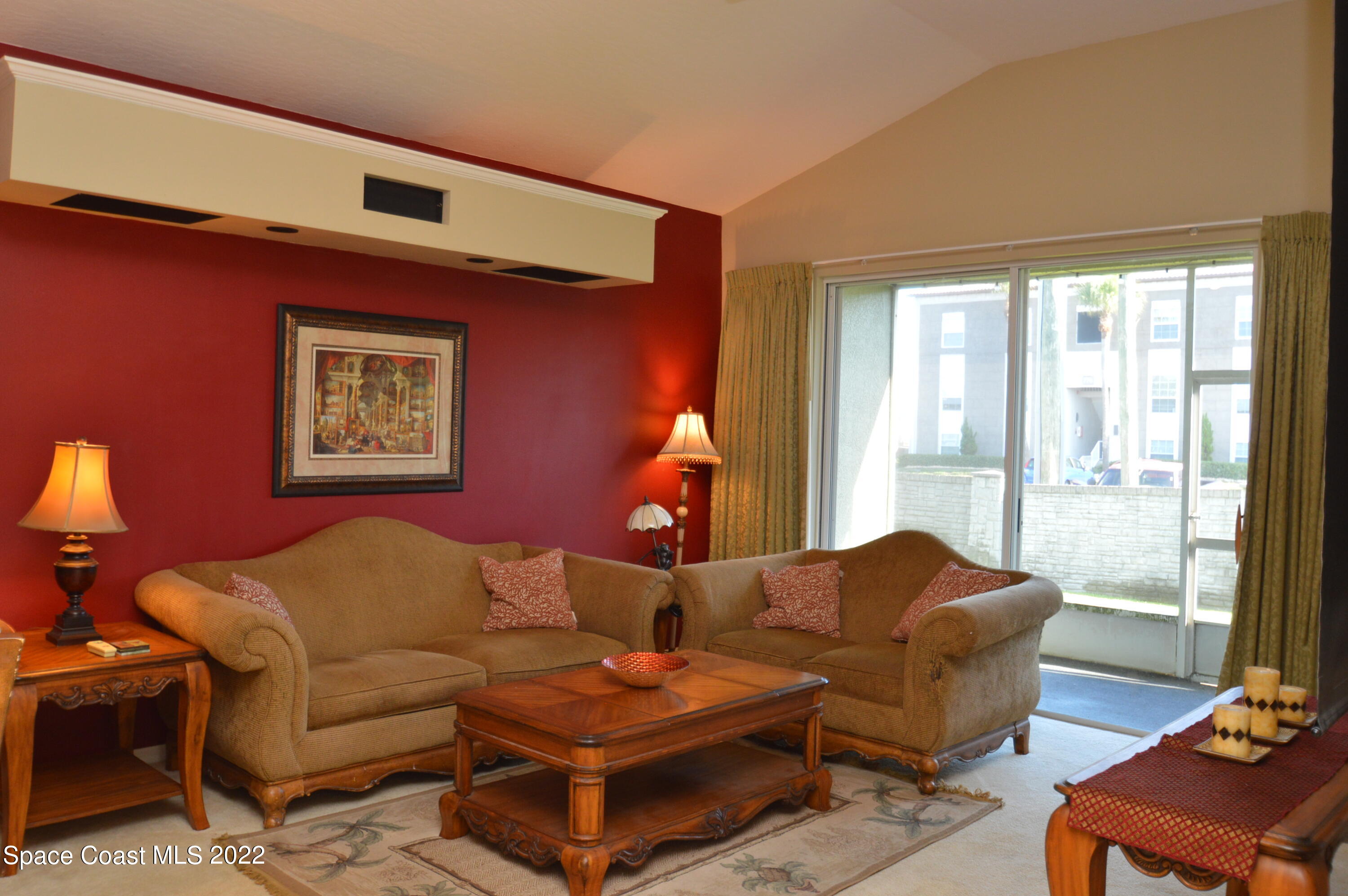 274 Intrepid Way Indialantic, FL 32903 - Photo 5 of 23 a living room with furniture and a large window