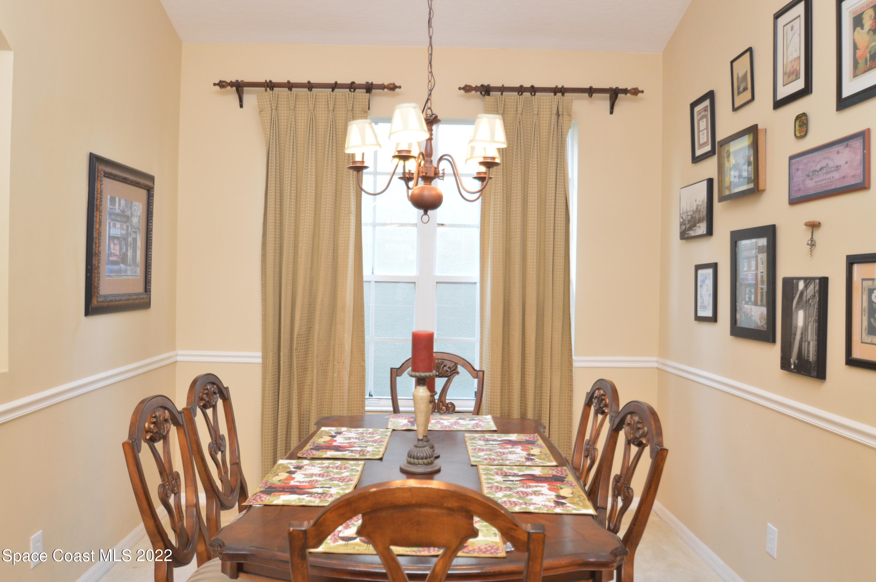 274 Intrepid Way Indialantic, FL 32903 - Photo 8 of 23 a view of a dining room with furniture window and outside view