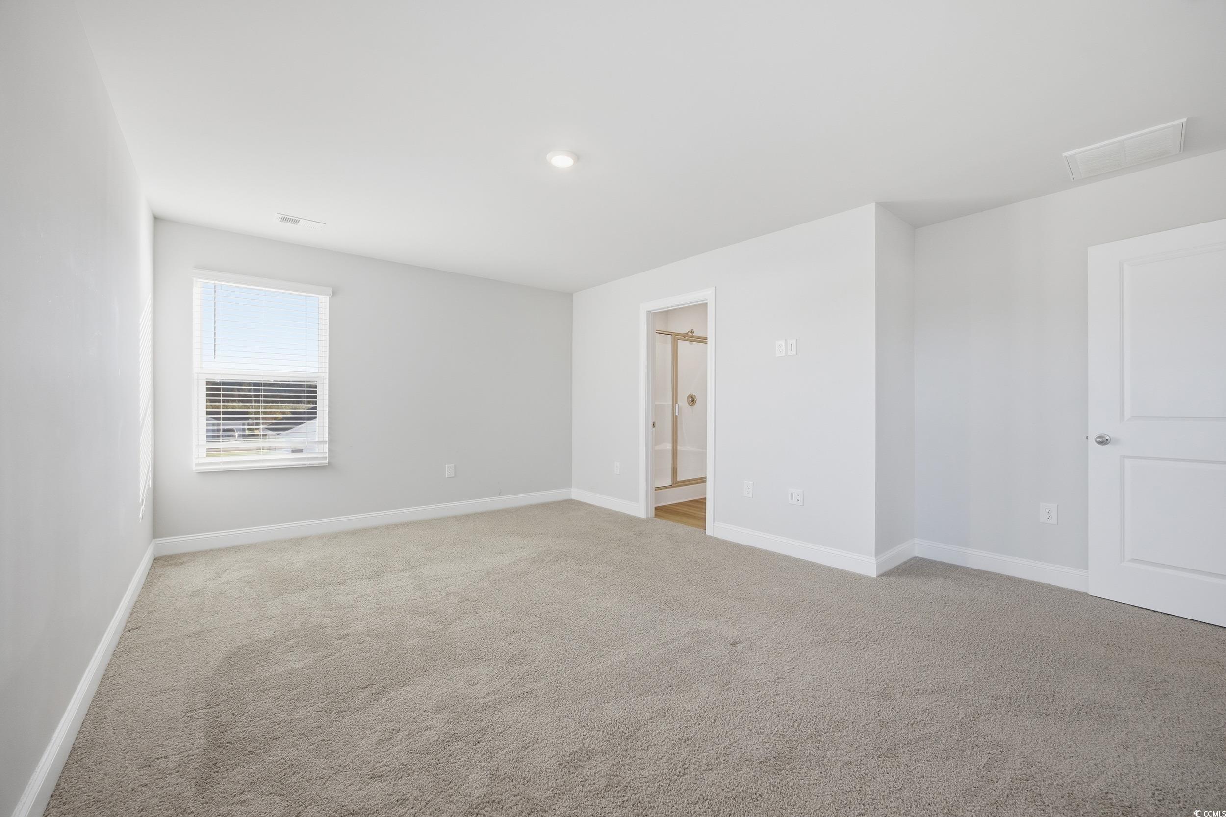 1052 Kinness Drive Conway, SC 29527 - Photo 16 of 38 Spare room with light carpet and baseboards