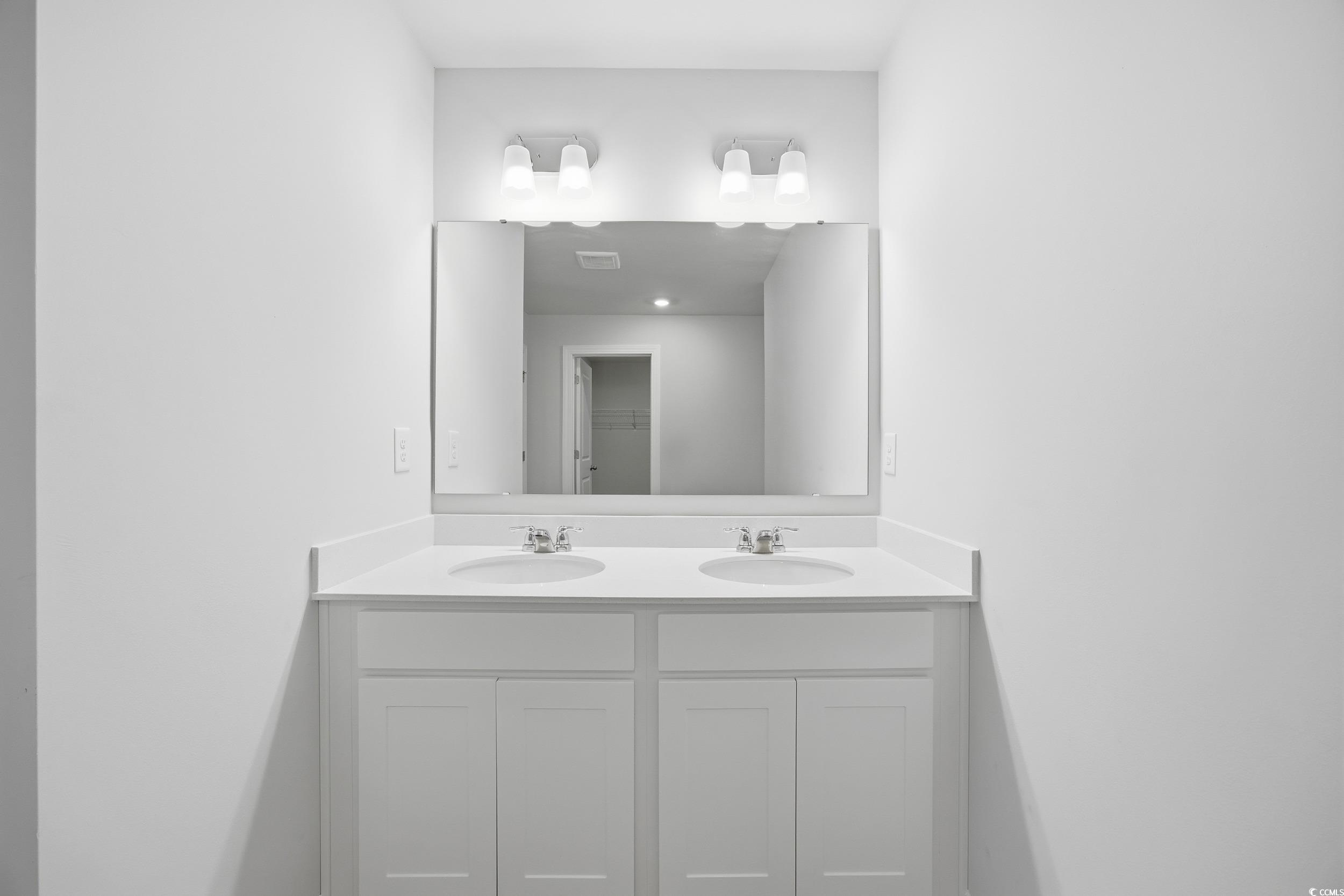 1052 Kinness Drive Conway, SC 29527 - Photo 18 of 38 Full bathroom with double vanity and a spacious closet