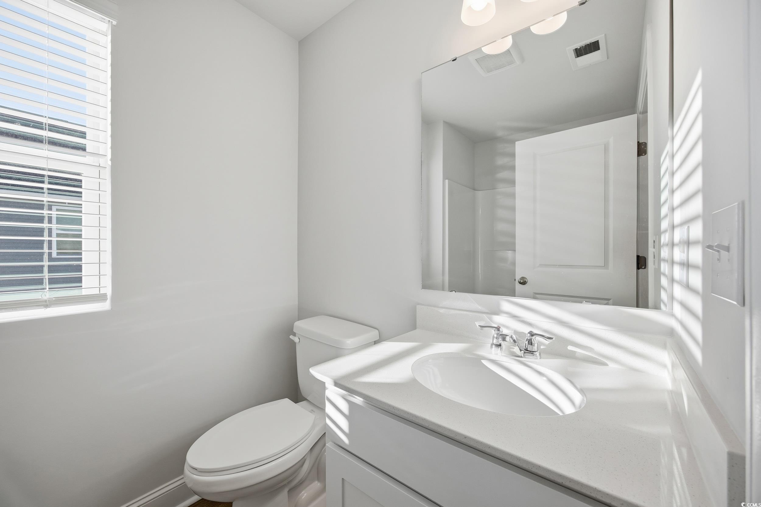 1052 Kinness Drive Conway, SC 29527 - Photo 25 of 38 Bathroom featuring vanity and toilet