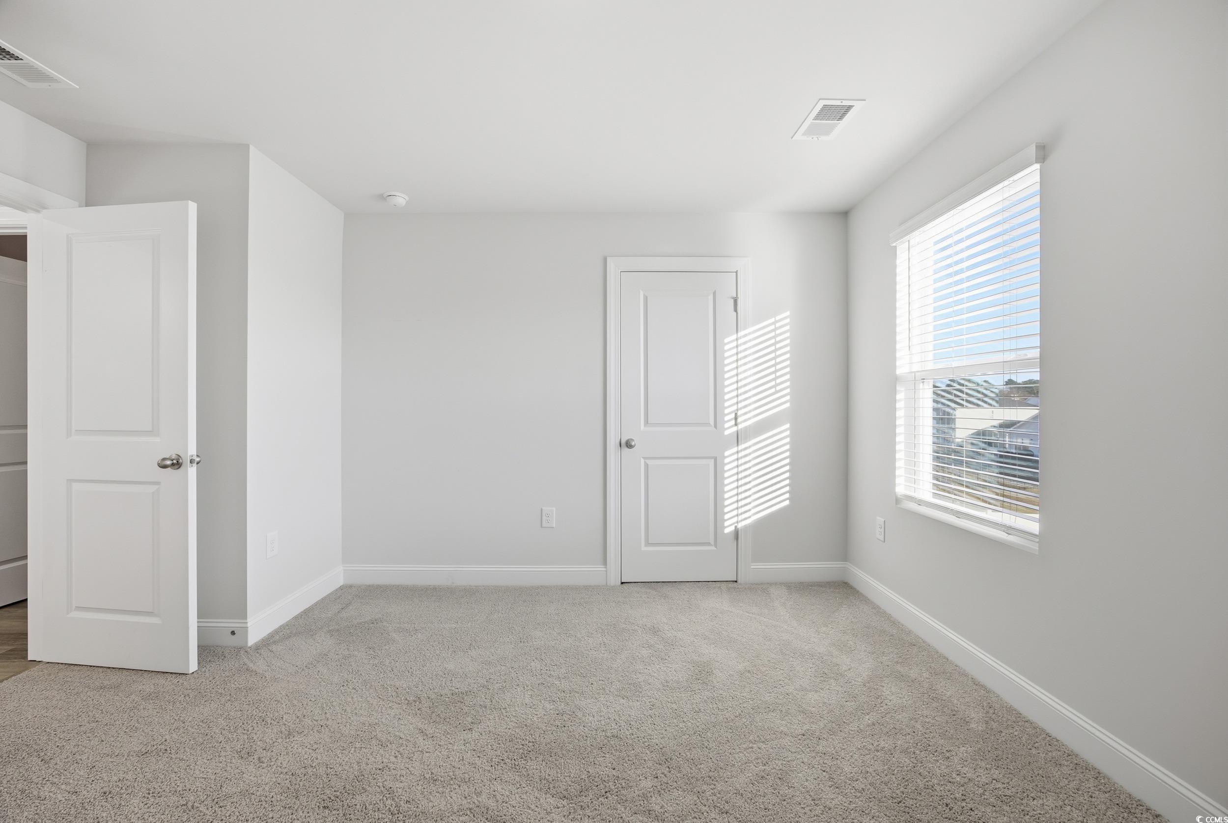 1052 Kinness Drive Conway, SC 29527 - Photo 27 of 38 Unfurnished bedroom with light carpet