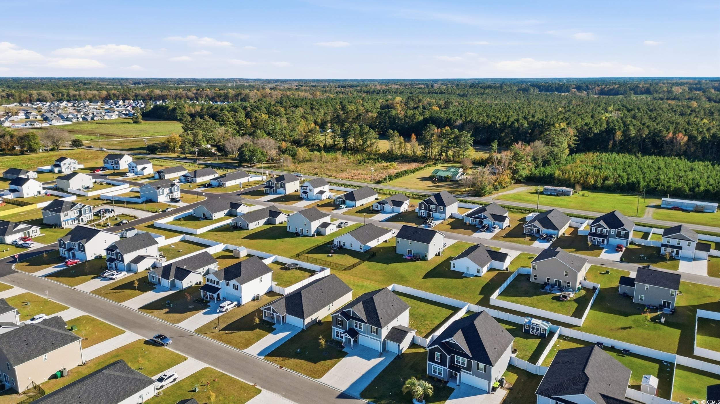 1052 Kinness Drive Conway, SC 29527 - Photo 35 of 38 Aerial view of residential area featuring a heavily wooded area