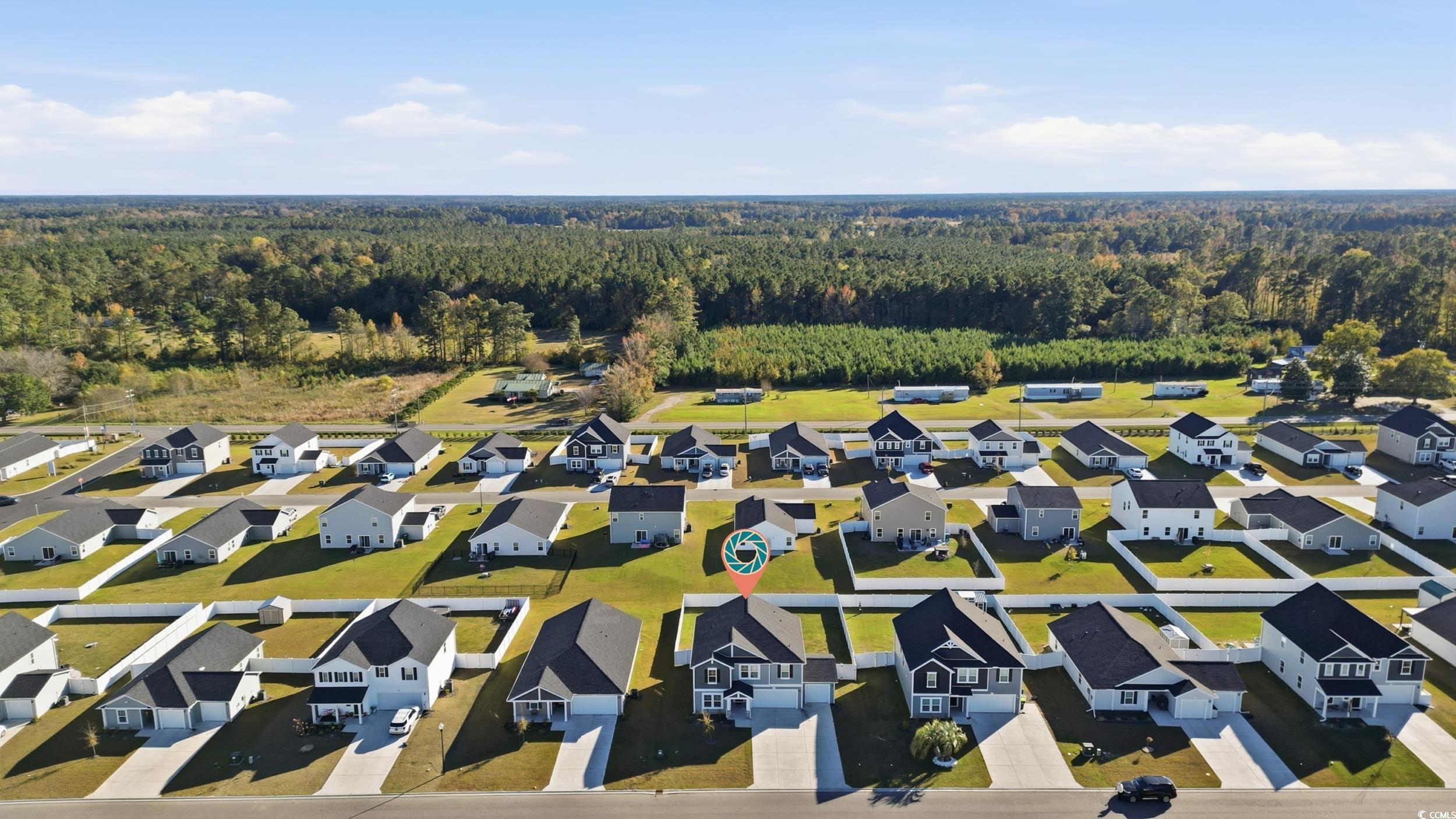 1052 Kinness Drive Conway, SC 29527 - Photo 38 of 38 Aerial perspective of suburban area featuring a forest