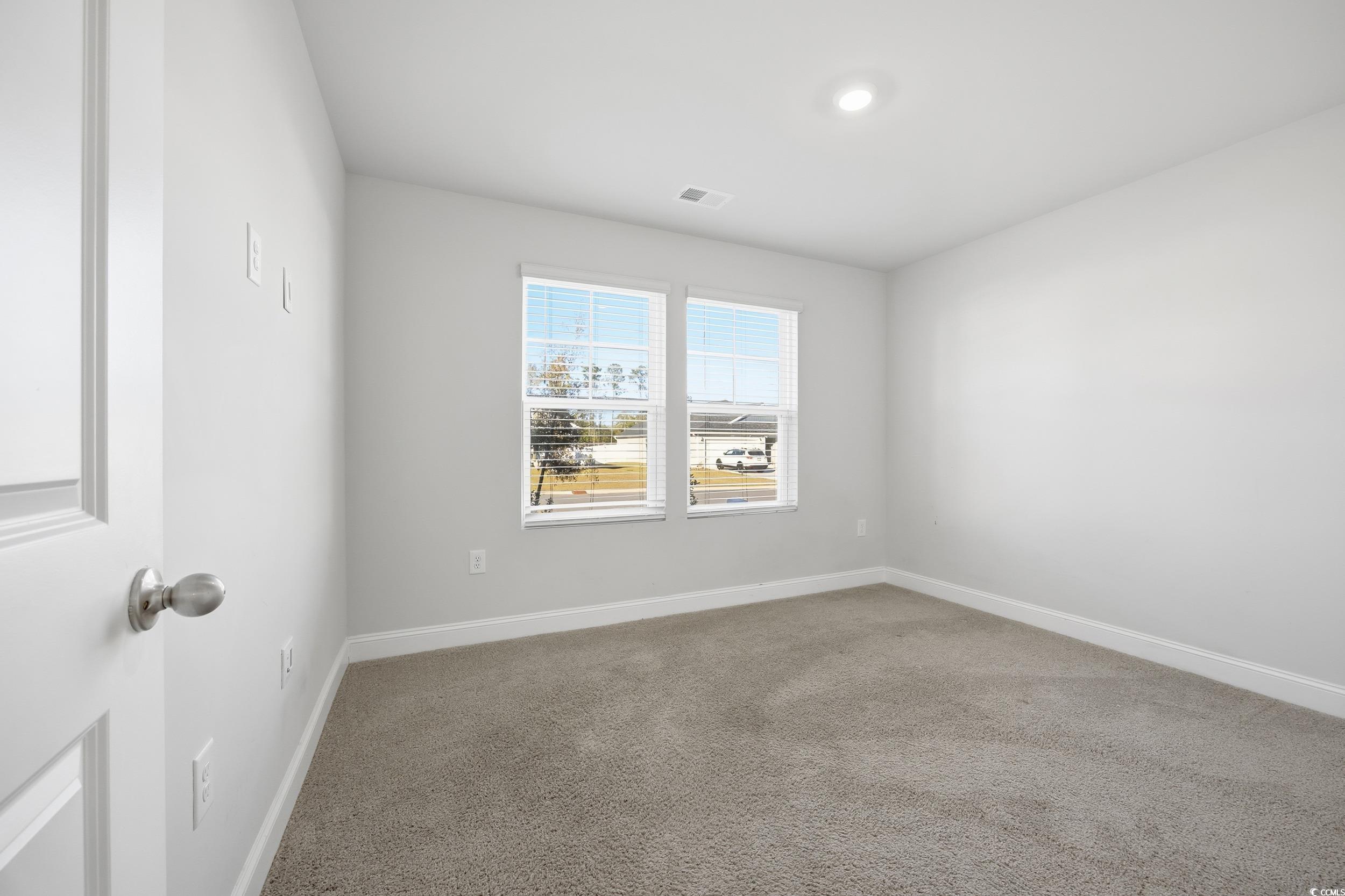 1052 Kinness Drive Conway, SC 29527 - Photo 7 of 38 Unfurnished room with carpet floors and baseboards