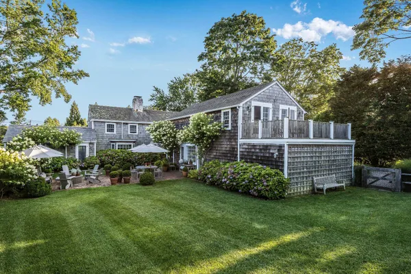 a view of a house with a garden