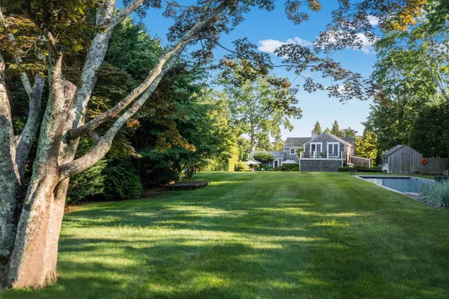 a view of a house with a big yard