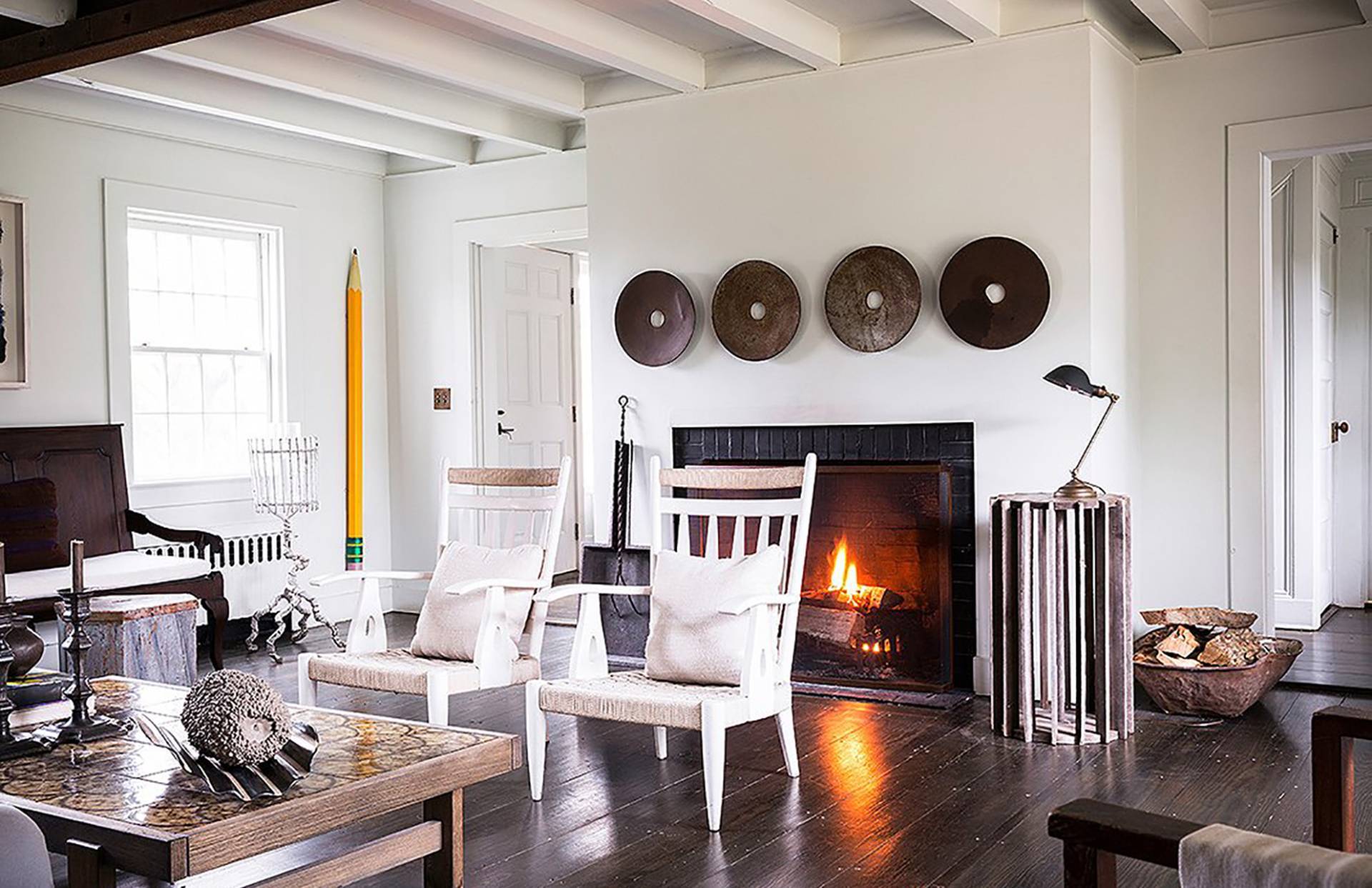 56 Sagaponack Road Bridgehampton, NY 11932 - Photo 4 of 23 a living room with furniture and a fireplace