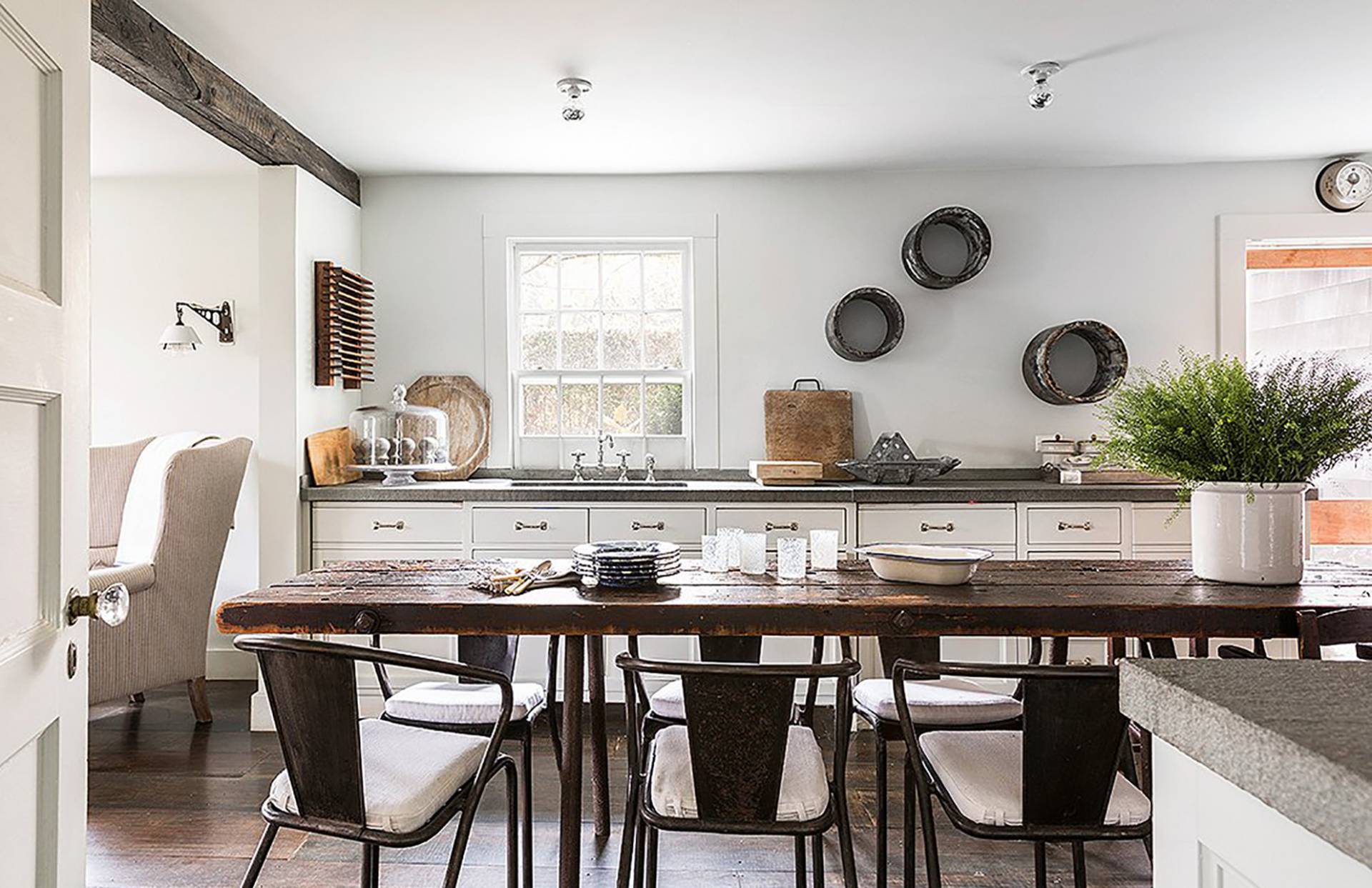 56 Sagaponack Road Bridgehampton, NY 11932 - Photo 7 of 23 a kitchen with a table and chairs in it